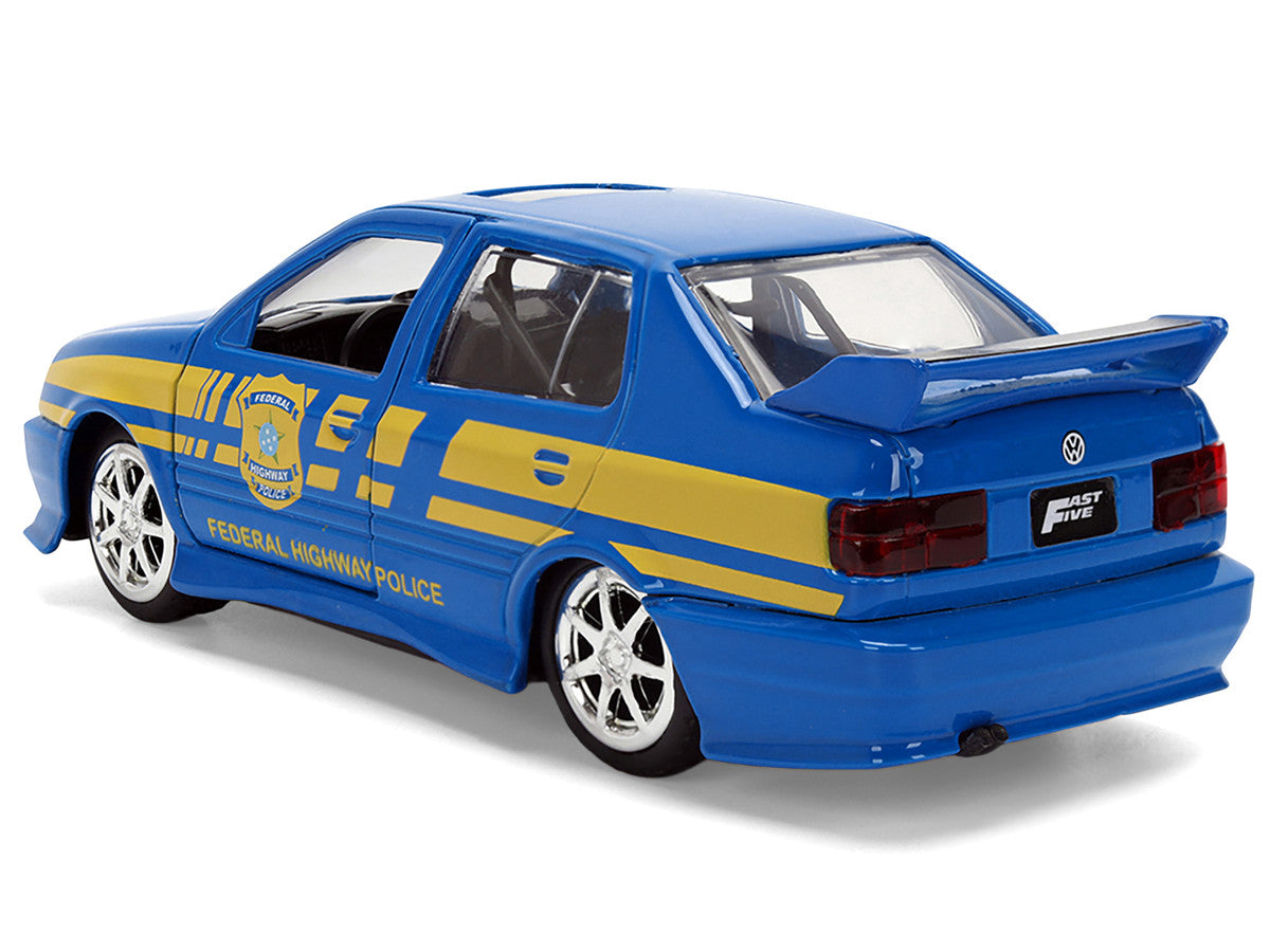 Volkswagen Jetta Police Vehicle "Rio Federal Highway Police" Blue with Yellow Stripes "Fast Five" (2011) Movie "Fast & Furious" Series 1/32 Diecast Model Car by Jada Jada
