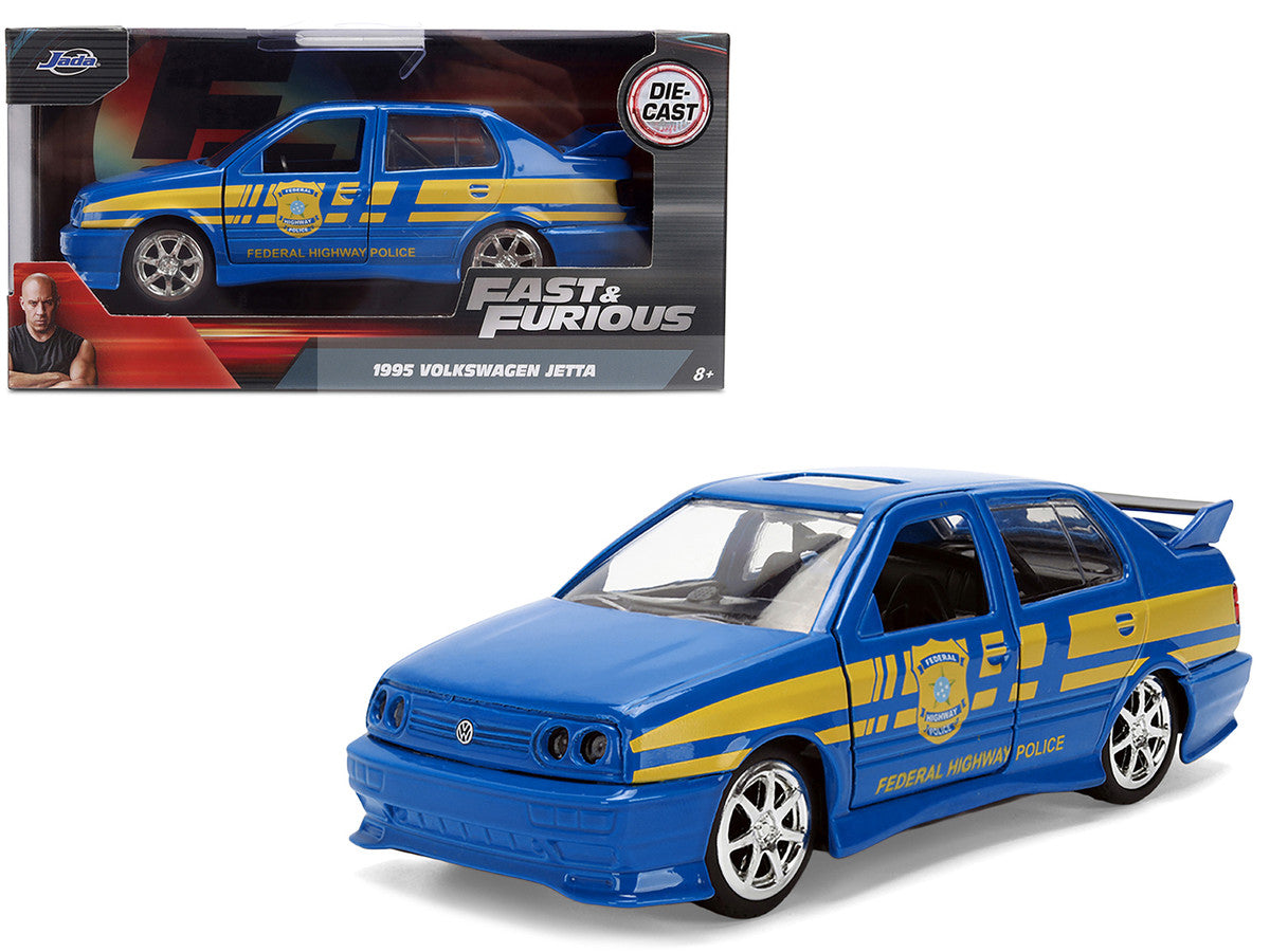 Volkswagen Jetta Police Vehicle "Rio Federal Highway Police" Blue with Yellow Stripes "Fast Five" (2011) Movie "Fast & Furious" Series 1/32 Diecast Model Car by Jada Jada