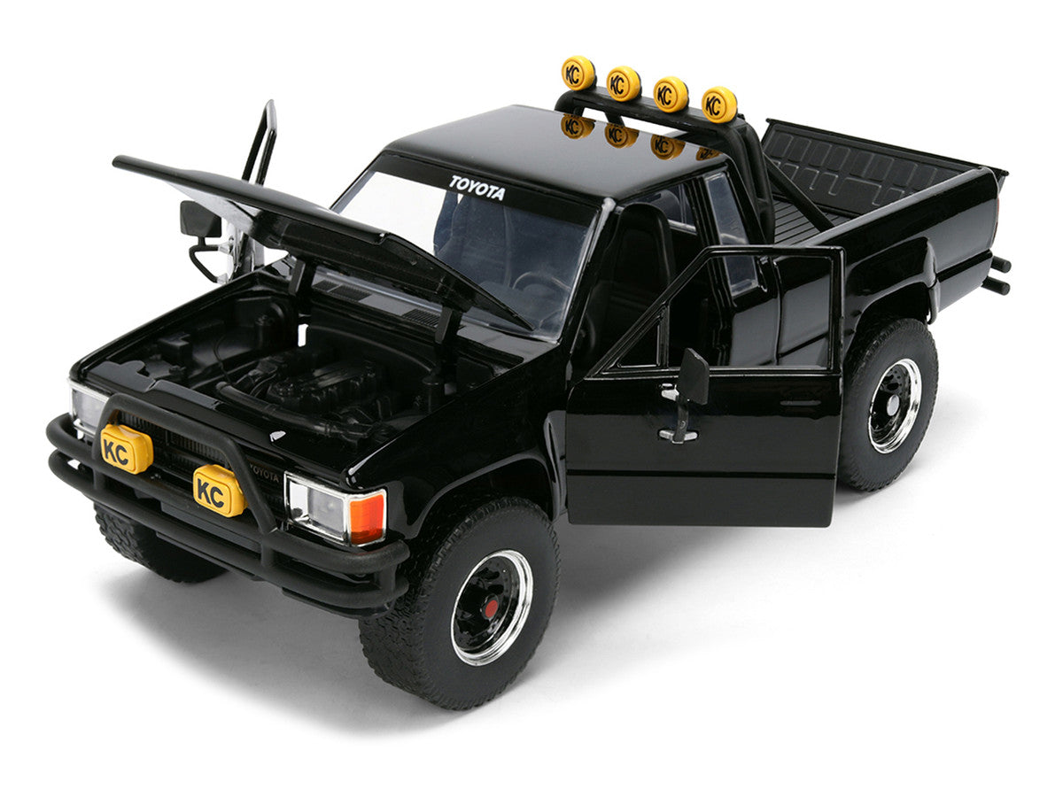 1985 Toyota SR5 Pickup Truck Black with Marty's Skateboard "Back to the Future" (1985) Movie "Hollywood Rides" Series 1/24 Diecast Model Car by Jada Jada