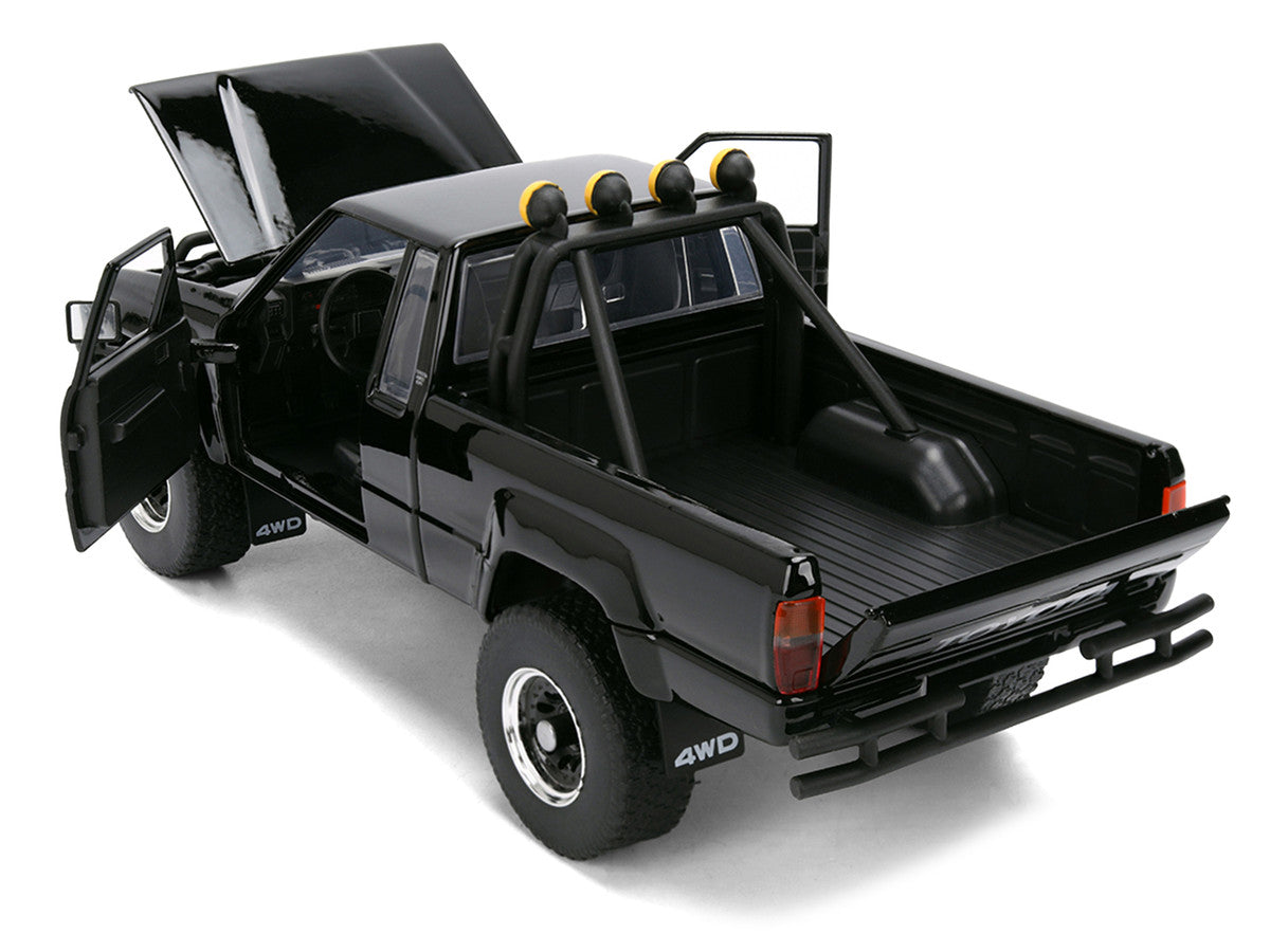 1985 Toyota SR5 Pickup Truck Black with Marty's Skateboard "Back to the Future" (1985) Movie "Hollywood Rides" Series 1/24 Diecast Model Car by Jada Jada