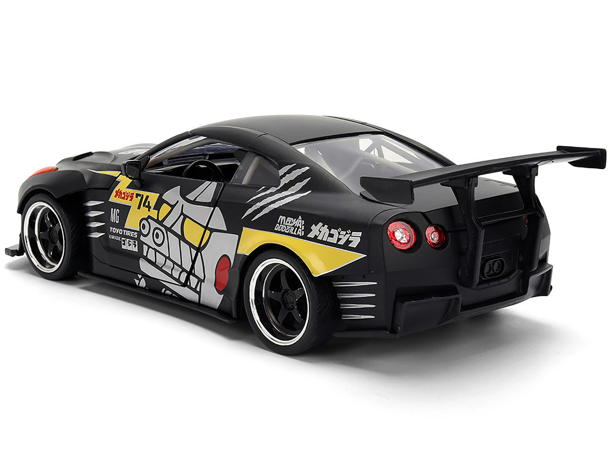 2009 Nissan GT-R (R35) Ben Sopra Matt Black with "Mechagodzilla" Graphics "Hollywood Rides" Series 1/24 Diecast Model Car by Jada Jada