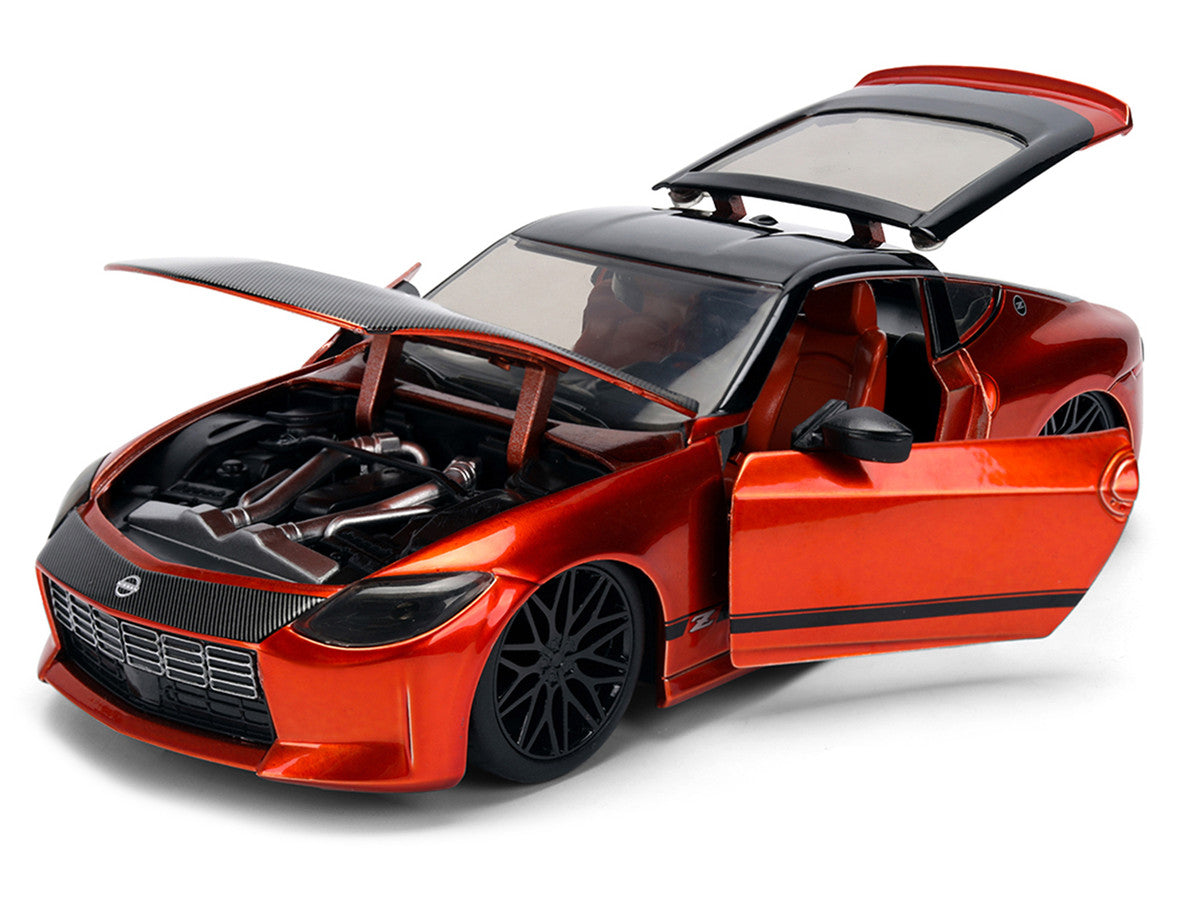 2023 Nissan Z Orange Metallic with Carbon Hood and Black Top "JDM Tuners" Series 1/24 Diecast Model Car by Jada Jada