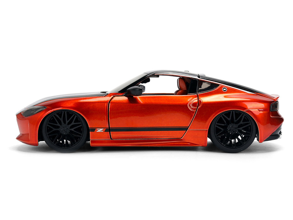 2023 Nissan Z Orange Metallic with Carbon Hood and Black Top "JDM Tuners" Series 1/24 Diecast Model Car by Jada Jada
