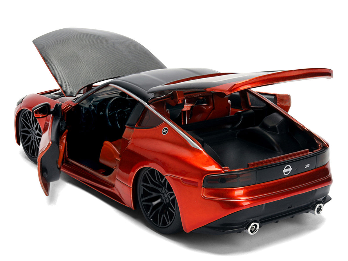 2023 Nissan Z Orange Metallic with Carbon Hood and Black Top "JDM Tuners" Series 1/24 Diecast Model Car by Jada Jada