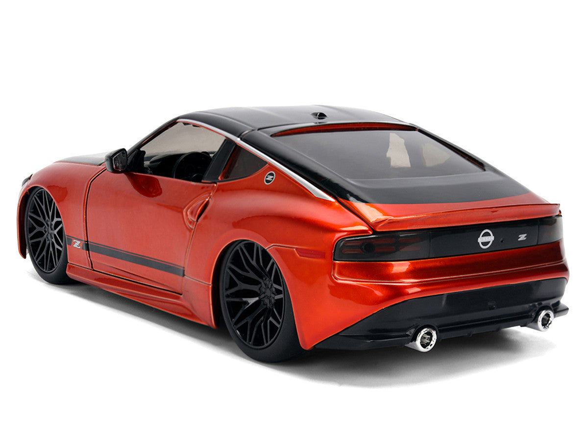 2023 Nissan Z Orange Metallic with Carbon Hood and Black Top "JDM Tuners" Series 1/24 Diecast Model Car by Jada Jada