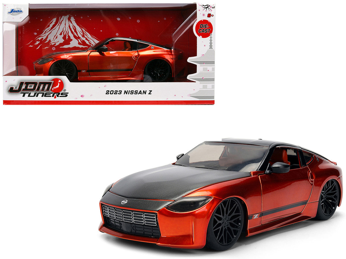 2023 Nissan Z Orange Metallic with Carbon Hood and Black Top "JDM Tuners" Series 1/24 Diecast Model Car by Jada Jada