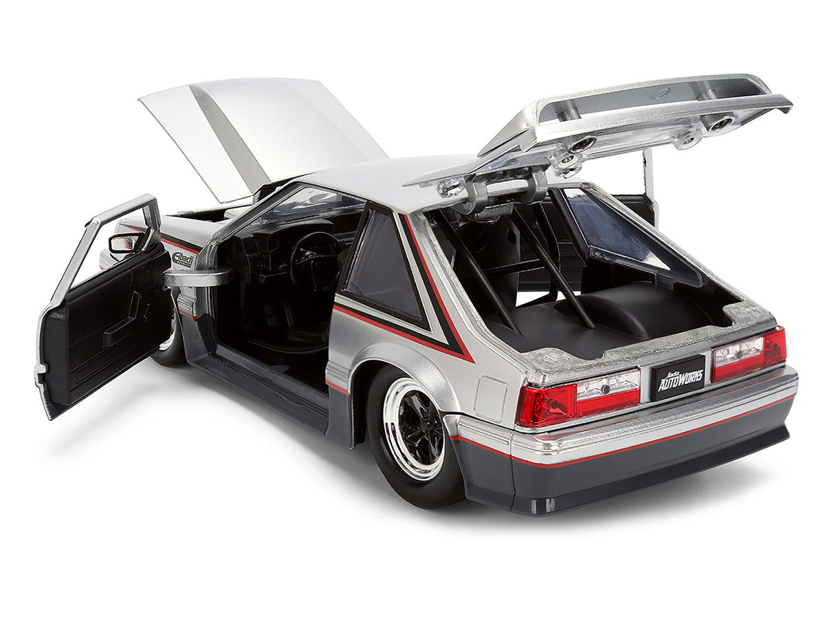 1989 Ford Mustang GT Silver Metallic and Gray with Black and Red Stripes "AutoWorks" Series 1/24 Diecast Car Model by Jada Jada