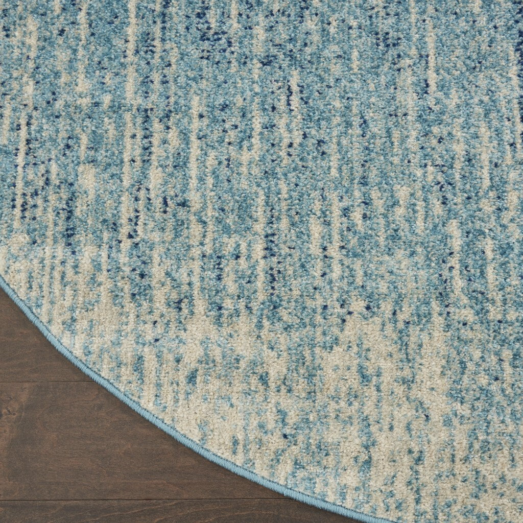 8' Blue and Ivory Abstract Power Loom Round Rug