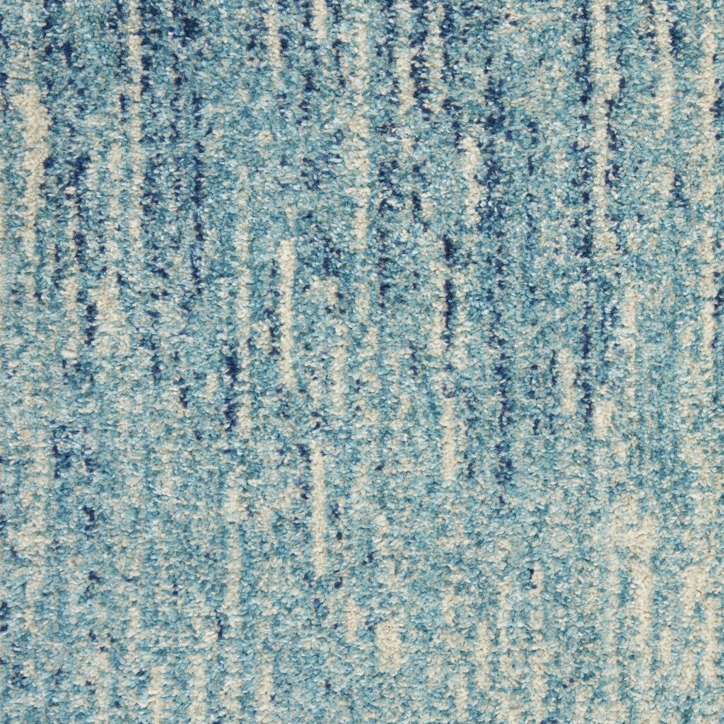 8' Blue and Ivory Abstract Power Loom Round Rug