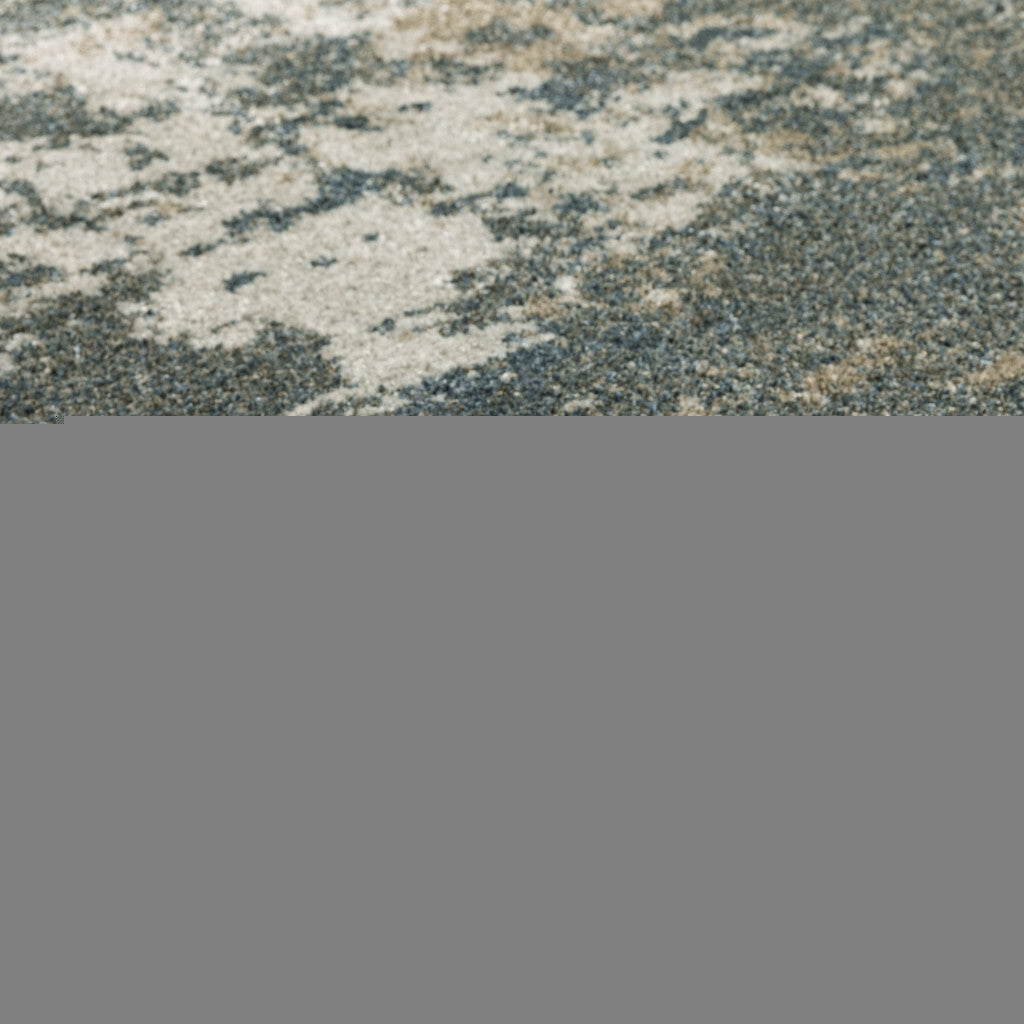 5' X 8' Tan and Gray Abstract Power Loom Area Rug