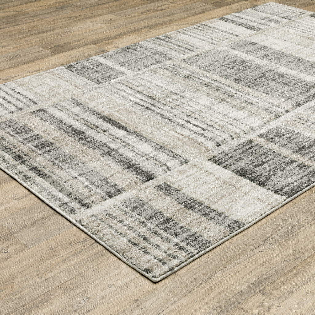 3' X 5' Grey Charcoal Ivory Tan Brown And Beige Geometric Power Loom Stain Resistant Area Rug W2B