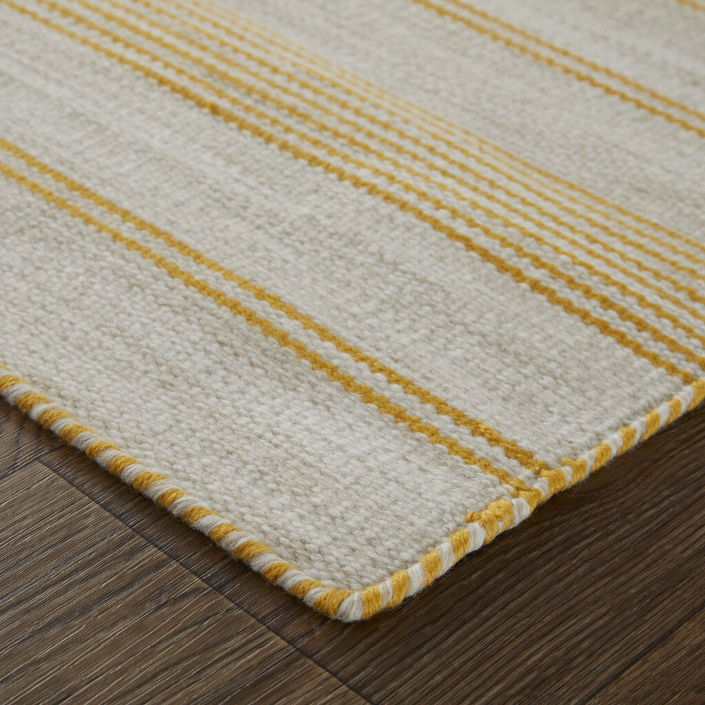 4' X 6' Yellow And Ivory Striped Dhurrie Hand Woven Stain Resistant Area Rug