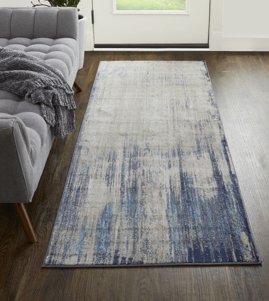 8' Tan Blue And Ivory Abstract Power Loom Distressed Runner Rug