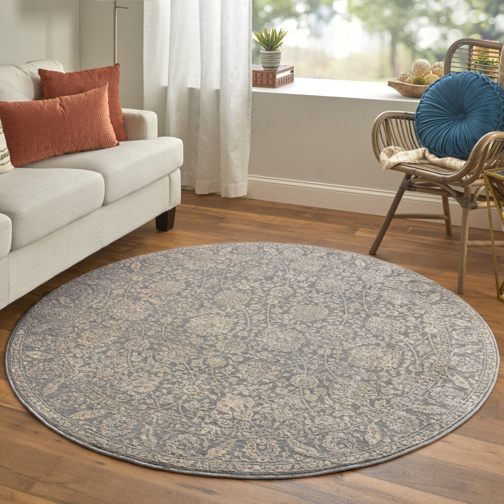 6' Taupe And Ivory Round Floral Power Loom Area Rug