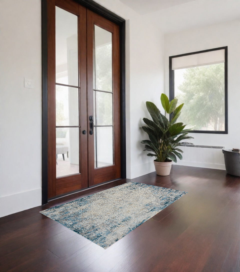 2' X 3' Blue and Ivory Abstract Area Rug W2B