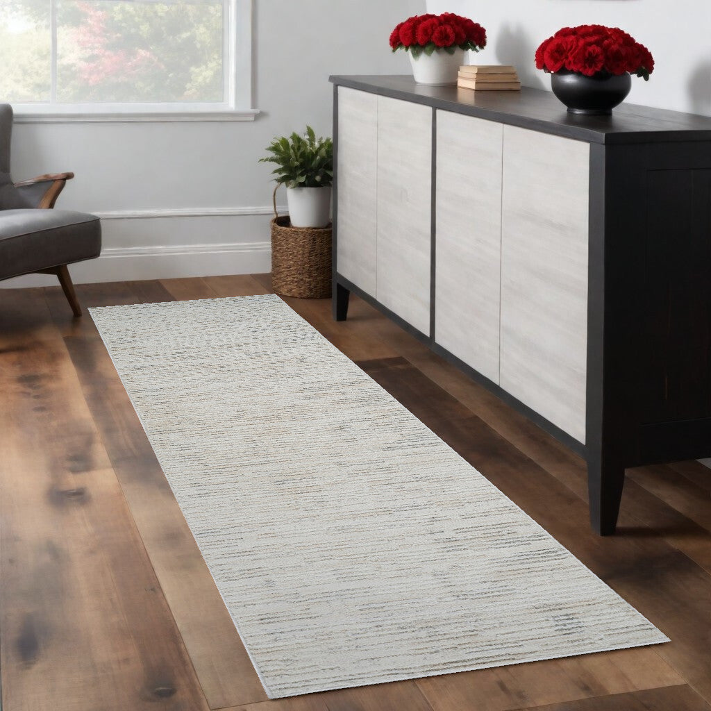 8' Gray and Beige Geometric Distressed Area Rug