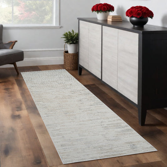 8' Gray and Beige Geometric Distressed Area Rug