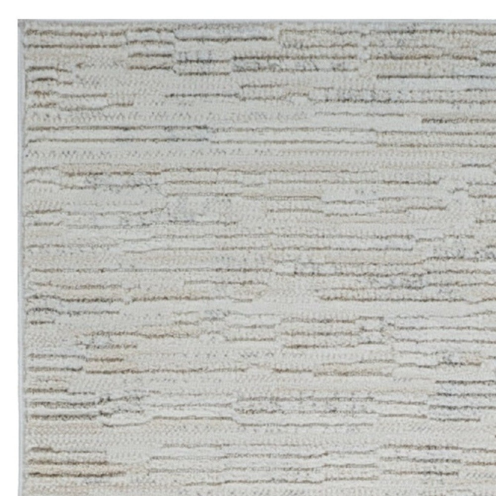 8' Gray and Beige Geometric Distressed Area Rug