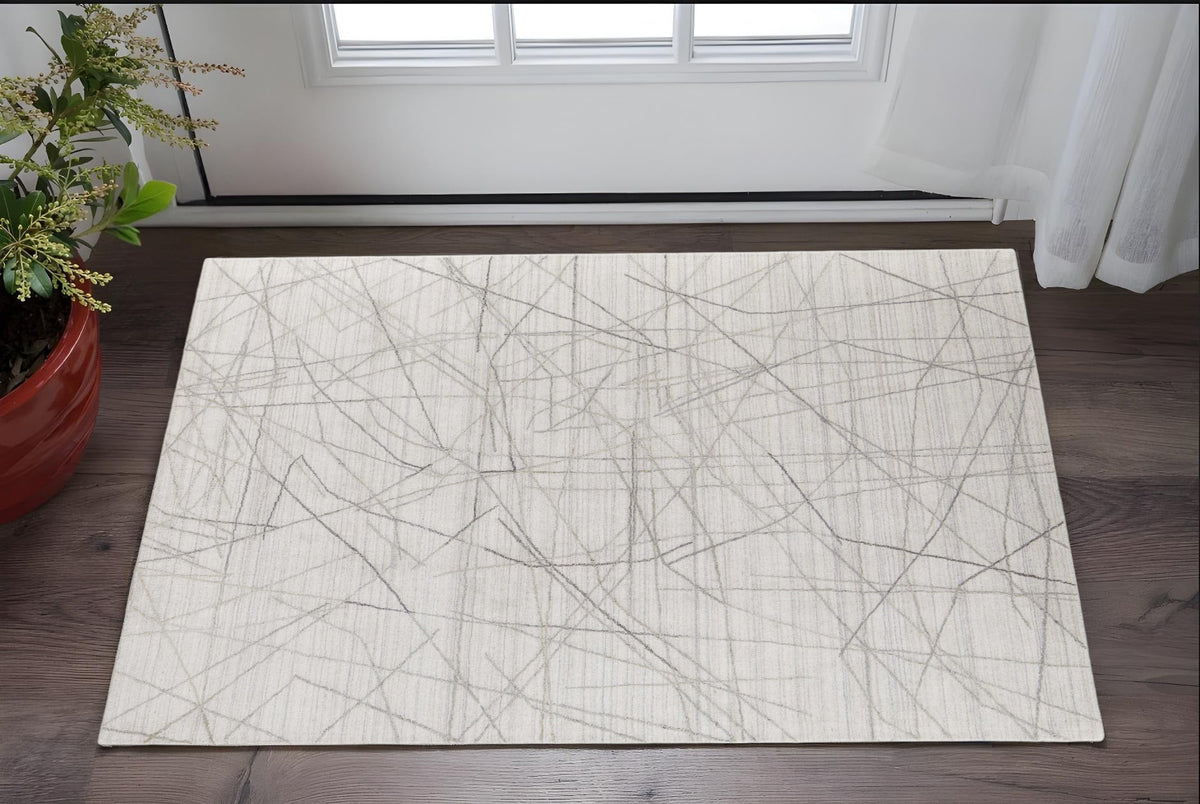 2' X 3' Gray and Ivory Abstract Hand Woven Area Rug W2B