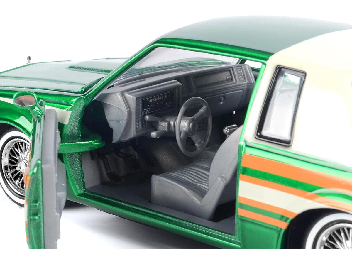1987 Buick Regal 3.8 SFI Turbo Green Metallic and Cream with Graphics "Get Low" Series 1/24 Diecast Model Car by Motormax Motormax