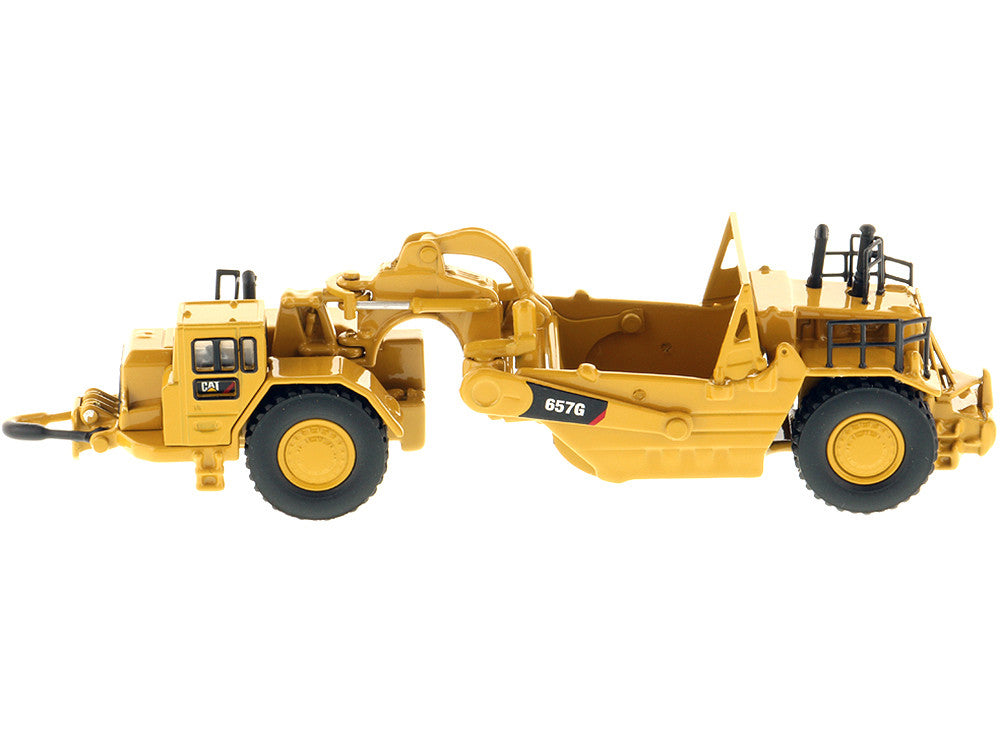 CAT Caterpillar 657G Wheeled Scraper Tractor "High Line" Series 1/125 Diecast Model by Diecast Masters Diecast Masters