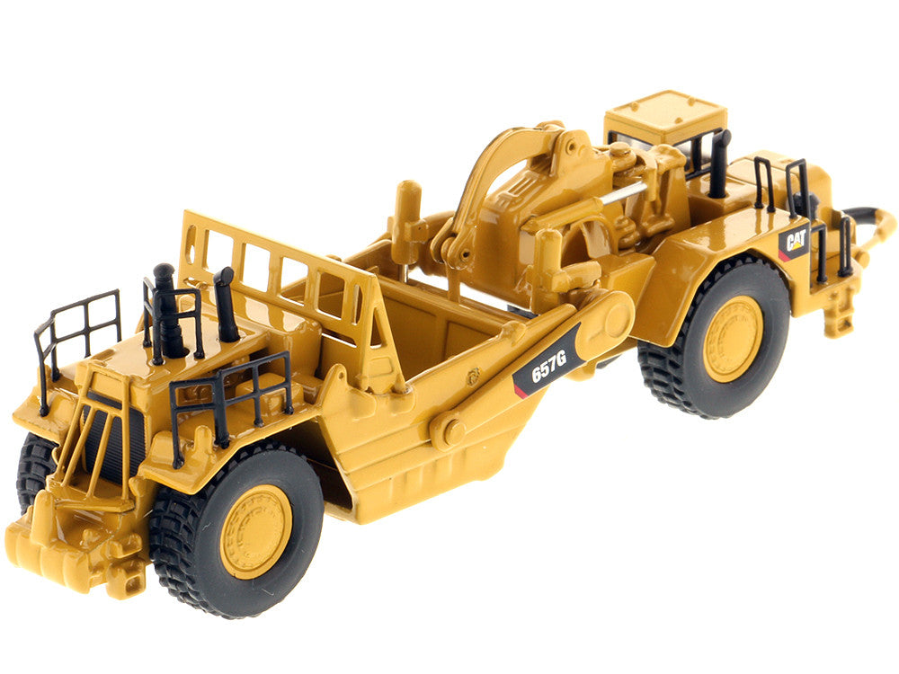 CAT Caterpillar 657G Wheeled Scraper Tractor "High Line" Series 1/125 Diecast Model by Diecast Masters Diecast Masters