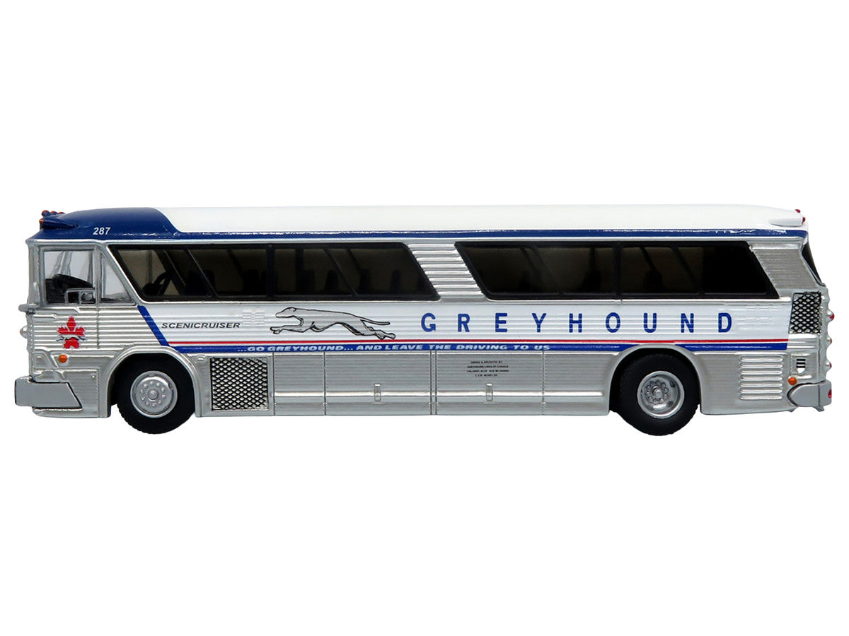 1964 MCI MC-5A Coach Bus "Greyhound Canada" White with Blue Stripes "Vintage Bus & Motorcoach Collection" Limited Edition to 504 pieces Worldwide 1/87 (HO) Diecast Model by Iconic Replicas Iconic Replicas