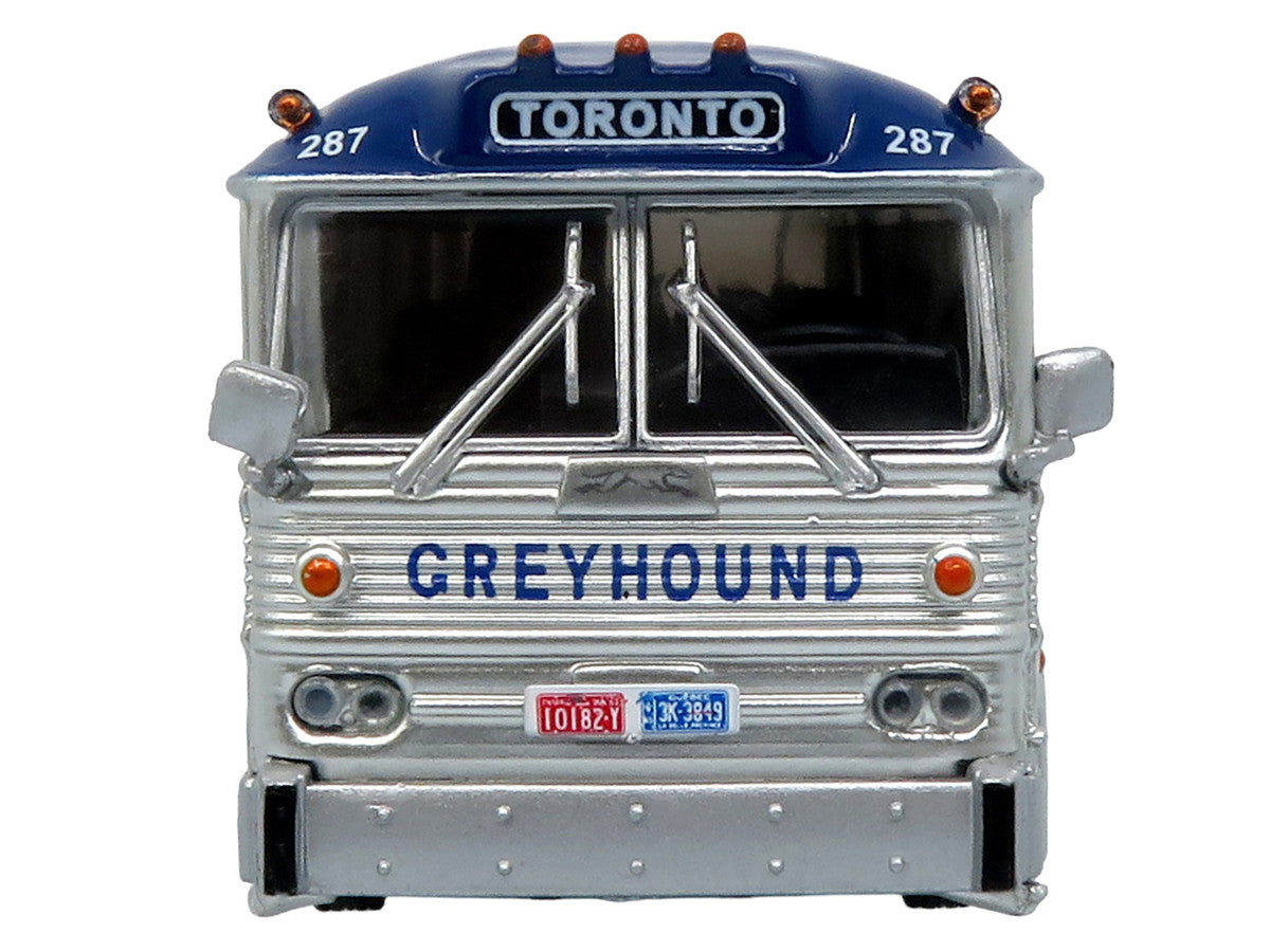 1964 MCI MC-5A Coach Bus "Greyhound Canada" White with Blue Stripes "Vintage Bus & Motorcoach Collection" Limited Edition to 504 pieces Worldwide 1/87 (HO) Diecast Model by Iconic Replicas Iconic Replicas