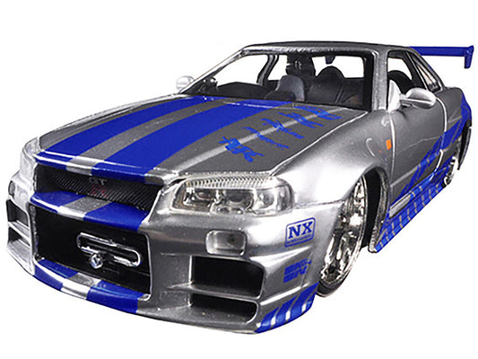 Brian's Nissan GTR Skyline R34 RHD (Right Hand Drive) Silver with Blue Stripes "Fast & Furious" Movie 1/24 Diecast Model Car by Jada-1