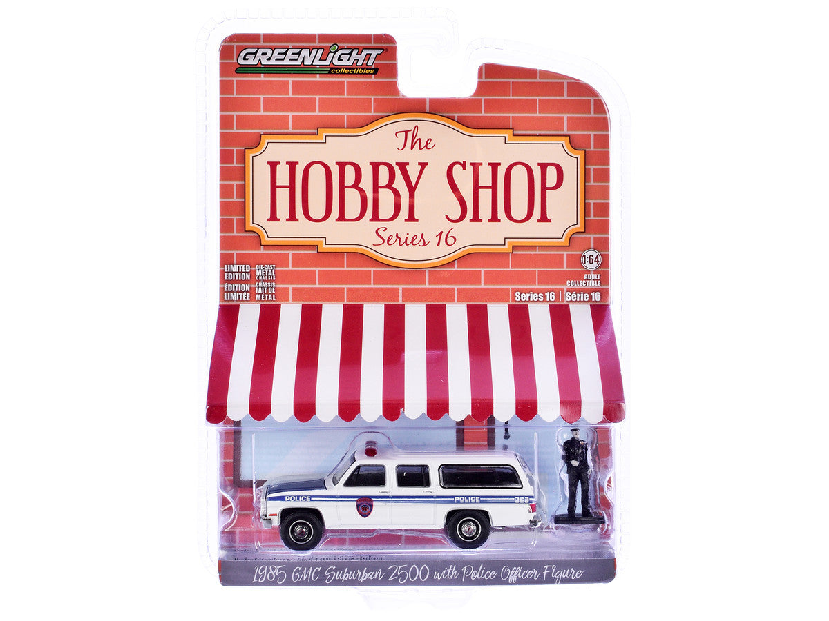 1985 GMC Suburban 2500 "New York City Transit Police Department" White with Blue Stripes and Police Officer Figure "The Hobby Shop" Series 16 1/64 Diecast Model Car by Greenlight Greenlight