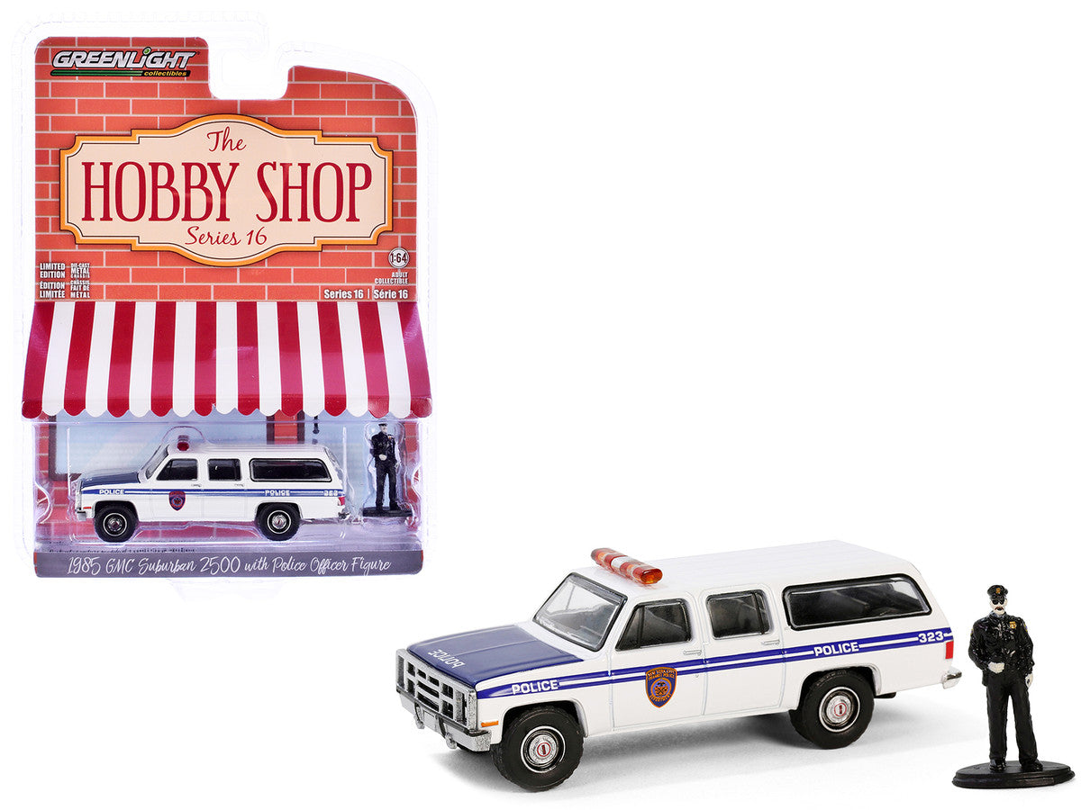 1985 GMC Suburban 2500 "New York City Transit Police Department" White with Blue Stripes and Police Officer Figure "The Hobby Shop" Series 16 1/64 Diecast Model Car by Greenlight Greenlight