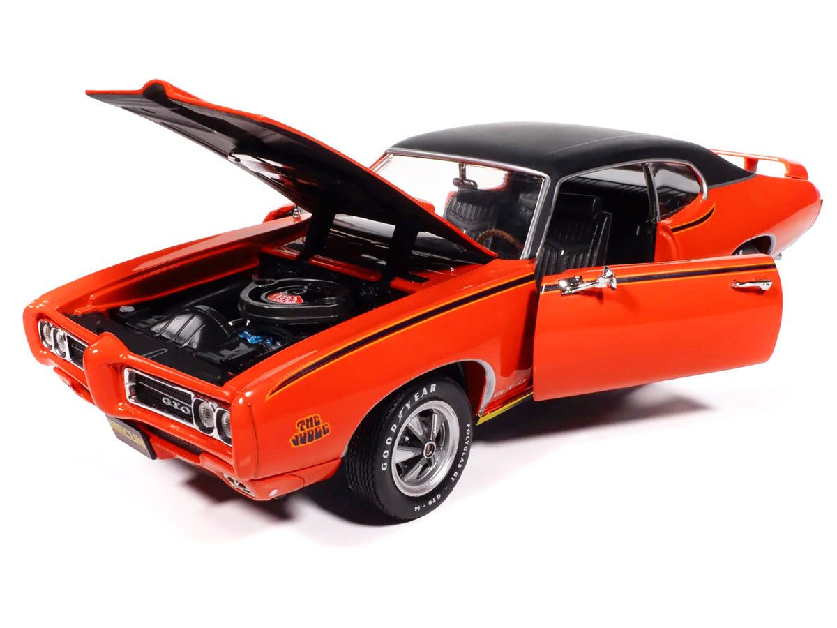 1969 Pontiac GTO Judge Carousel Red with Black Stripes and Black Vinyl Top "Mecum Auctions" "American Muscle" Series 1/18 Diecast Model Car by Auto World Autoworld