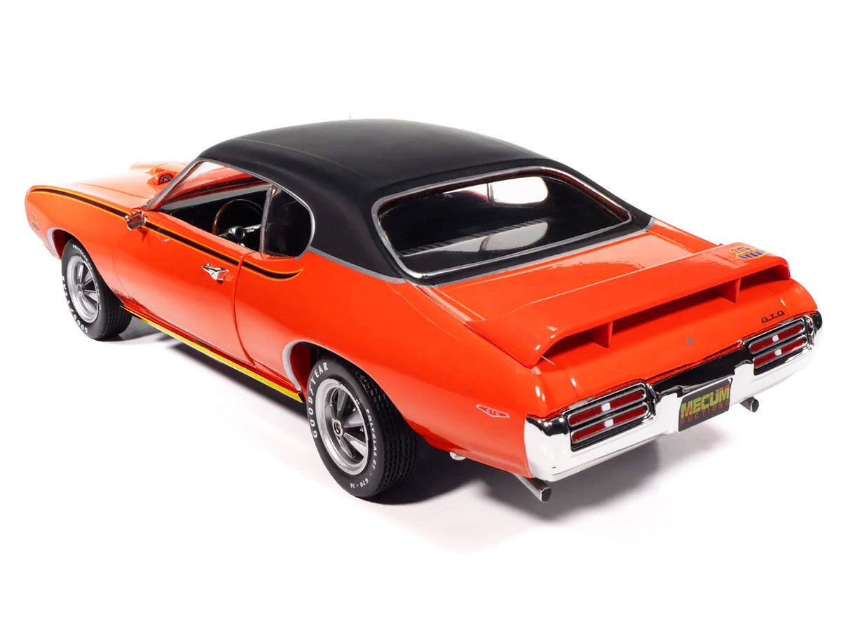 1969 Pontiac GTO Judge Carousel Red with Black Stripes and Black Vinyl Top "Mecum Auctions" "American Muscle" Series 1/18 Diecast Model Car by Auto World Autoworld