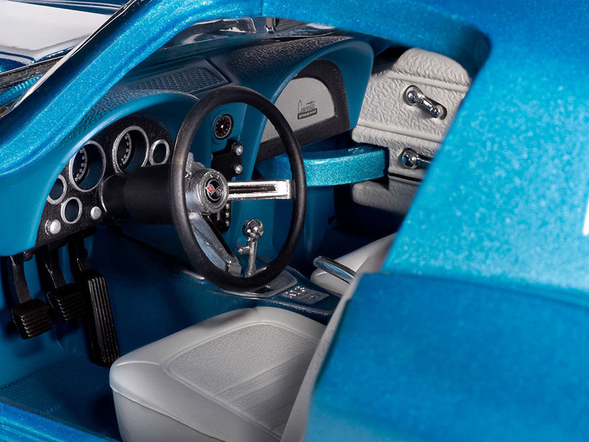 1967 Chevrolet Corvette Stingray Light Blue Metallic with White Hood Stripe "American Muscle" Series 1/18 Diecast Model Car by Auto World Autoworld