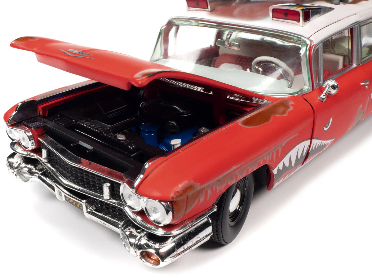 1959 Cadillac Eldorado Ambulance Red with White Top "Malibu Beach Rescue" (Weathered) with Surfboards on Roof "Surf Shark" 1/18 Diecast Model Car by Auto World Autoworld