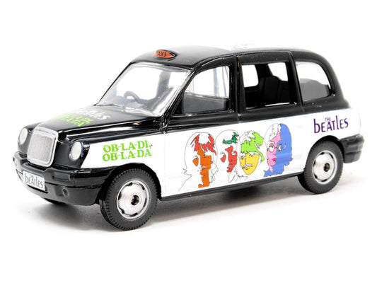 The Beatles London Taxi RHD (Right Hand Drive) "Ob-La-Di Ob-La-Da" Black and White with Graphics Diecast Model by Corgi-1