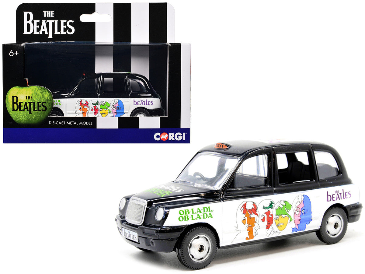 The Beatles London Taxi RHD (Right Hand Drive) "Ob-La-Di Ob-La-Da" Black and White with Graphics Diecast Model by Corgi-0
