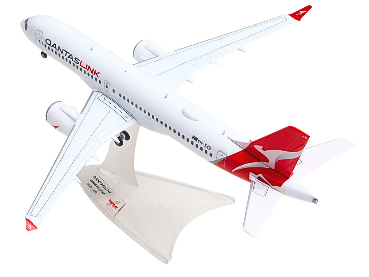 Airbus A220-300 Commercial Aircraft "QantasLink" (VH-X4B) White with Red Tail 1/200 Diecast Model by Herpa-1