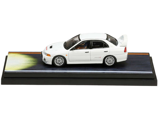 Mitsubishi Lancer RS Evolution IV RHD (Right Hand Drive) White "Monstar" with Seiji Iwaki Driver Figure "Initial D" (1995-2013) Manga 1/64 Diecast Model Car by Hobby Japan Hobby Japan