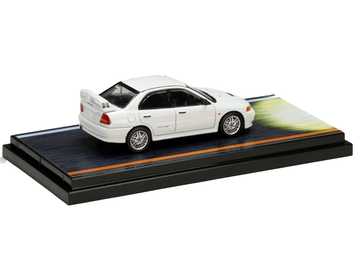 Mitsubishi Lancer RS Evolution IV RHD (Right Hand Drive) White "Monstar" with Seiji Iwaki Driver Figure "Initial D" (1995-2013) Manga 1/64 Diecast Model Car by Hobby Japan Hobby Japan