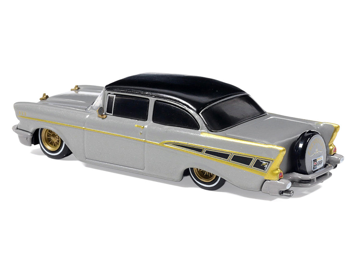 1957 Chevrolet Bel Air Lowrider Gray with Black Top and Gold Accents 1/64 Diecast Model Car by IXO Models IXO