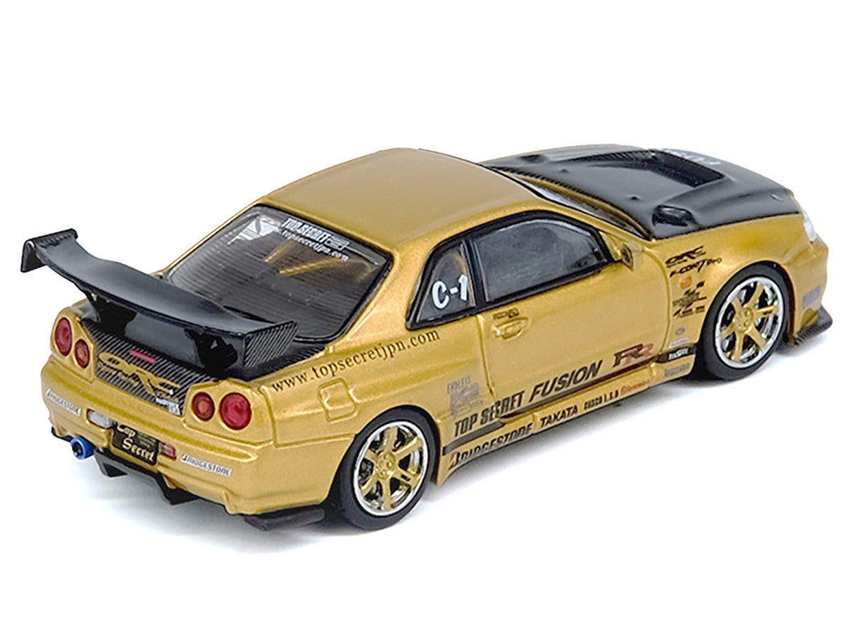 Nissan Skyline GT-R (R34) RHD (Right Hand Drive) "Top Secret" Gold Metallic with Carbon Hood and Trunk 1/64 Diecast Model Car by Inno Models Inno Models