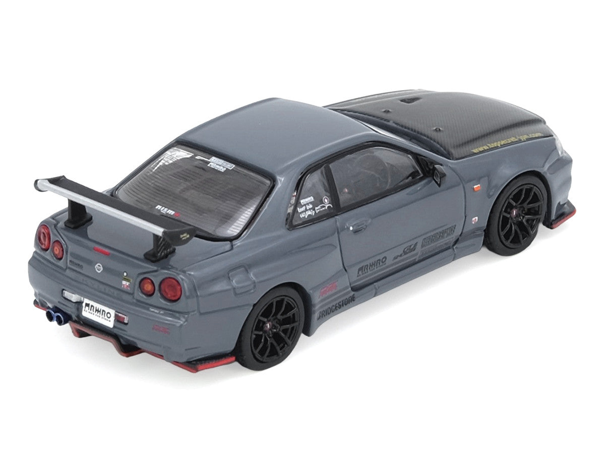 Nissan Skyline GT-R (R34) "Top Secret" RHD (Right Hand Drive) Stealth Gray with Carbon Hood "GTSHOW 2025 Event Edition" 1/64 Diecast Model Car by Inno Models-2