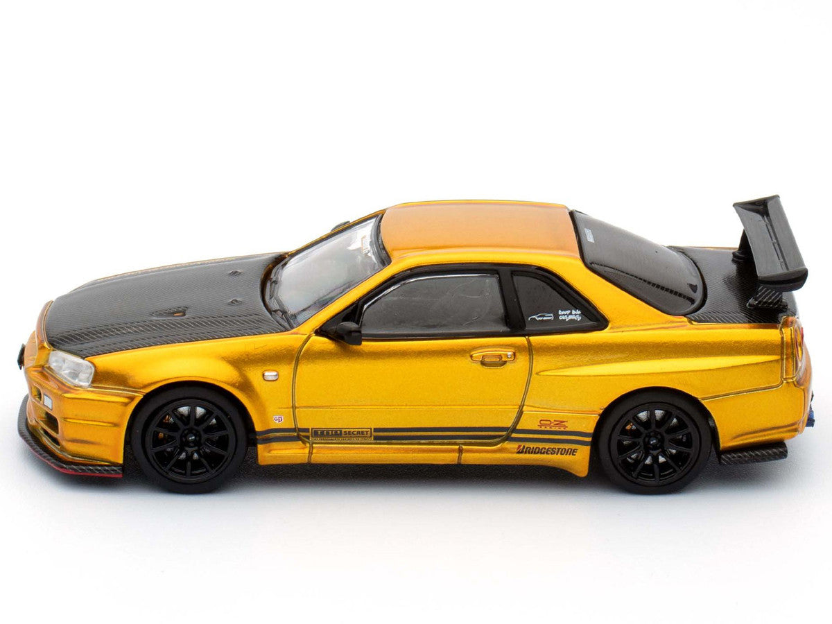 Nissan Skyline GT-R (R34) "Top Secret" RHD (Right Hand Drive) Gold Metallic with Carbon Hood and Trunk "Tokyo Auto Salon 2024 - Malaysia Diecast Expo 2024" 1/64 Diecast Model Car by Inno Models Inno Models
