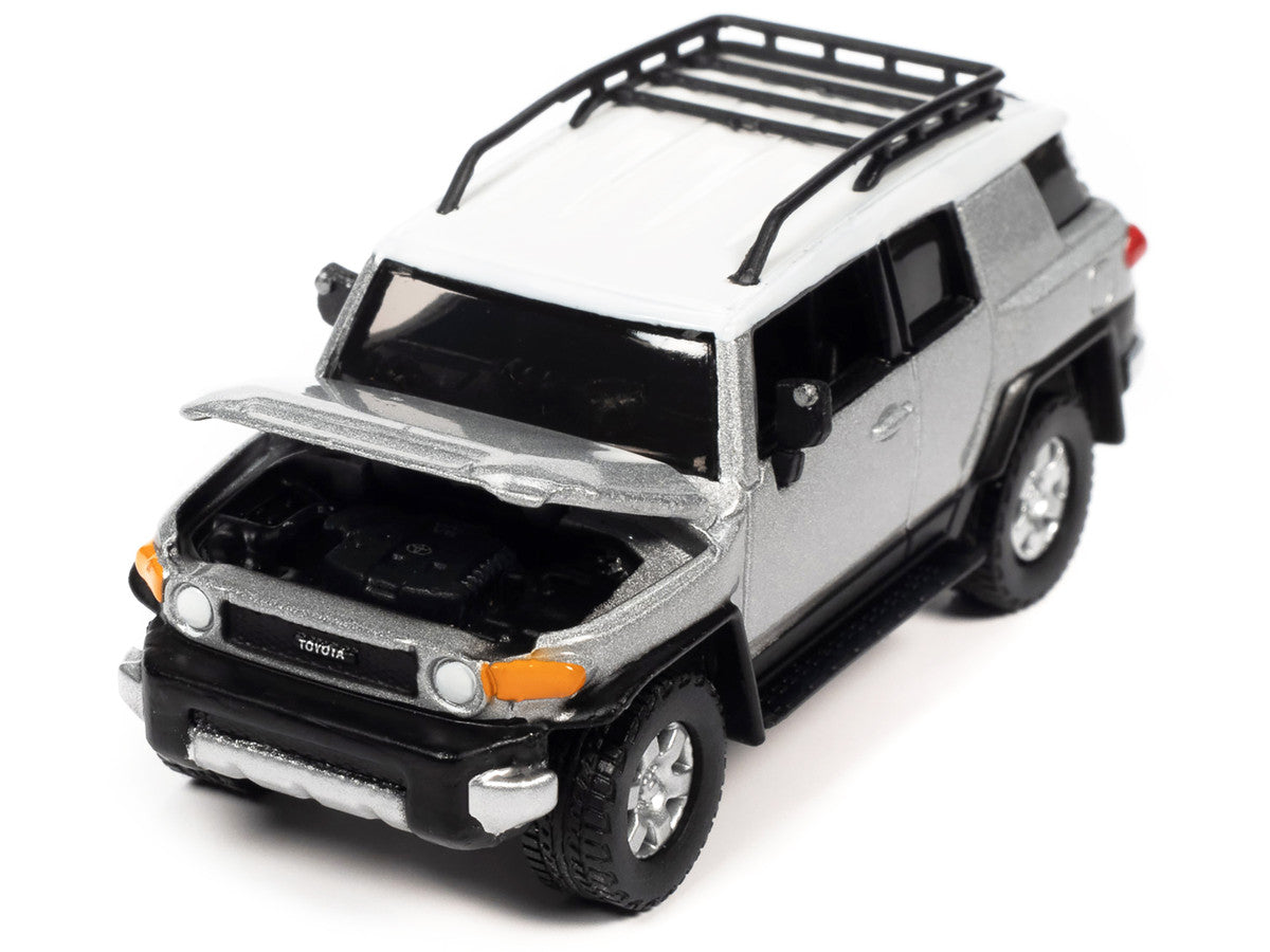 2007 Toyota FJ Cruiser Titanium Silver Metallic with White Top and Roofrack "Classic Gold Collection" Series Limited Edition 1/64 Diecast Model Car by Johnny Lightning Johnny Lightning