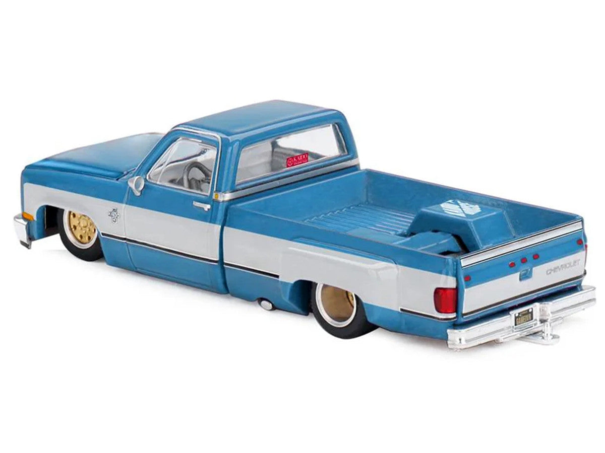 Chevrolet Silverado Dually Pickup Truck "Vintage Spec V1" Light Blue Metallic with White Sides and Interior (Designed by Jun Imai) "Kaido House" Special 1/64 Diecast Model Car by Mini GT Mini GT