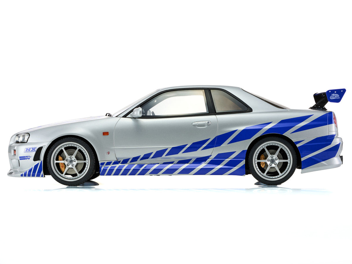 Nissan Skyline GT-R (R34) RHD (Right Hand Drive) Silver Metallic with Blue Graphics "2 Fast 2 Furious" (2003) Movie 1/12 Model Car by Kyosho Kyosho