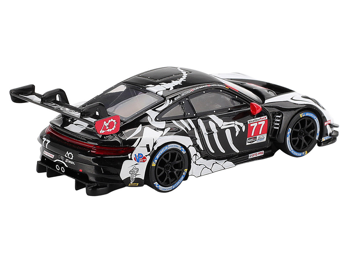 Porsche 911 GT3 R #77 Klaus Bachler - Laurin Heinrich - Michael Christensen "AO Racing Skeleton Rexy" GTD Pro IMSA "Petit Le Mans" (2025) Limited Edition 1/64 Diecast Model Car by Mini GT Mini GT