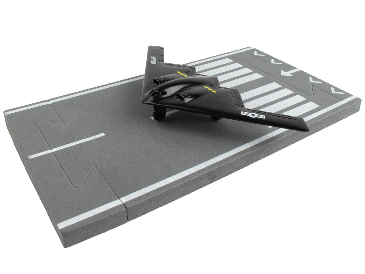 Northrop Grumman B-2 Spirit Stealth Aircraft Black "United States Air Force" with Runway Section Diecast Model Airplane by Runway24-1