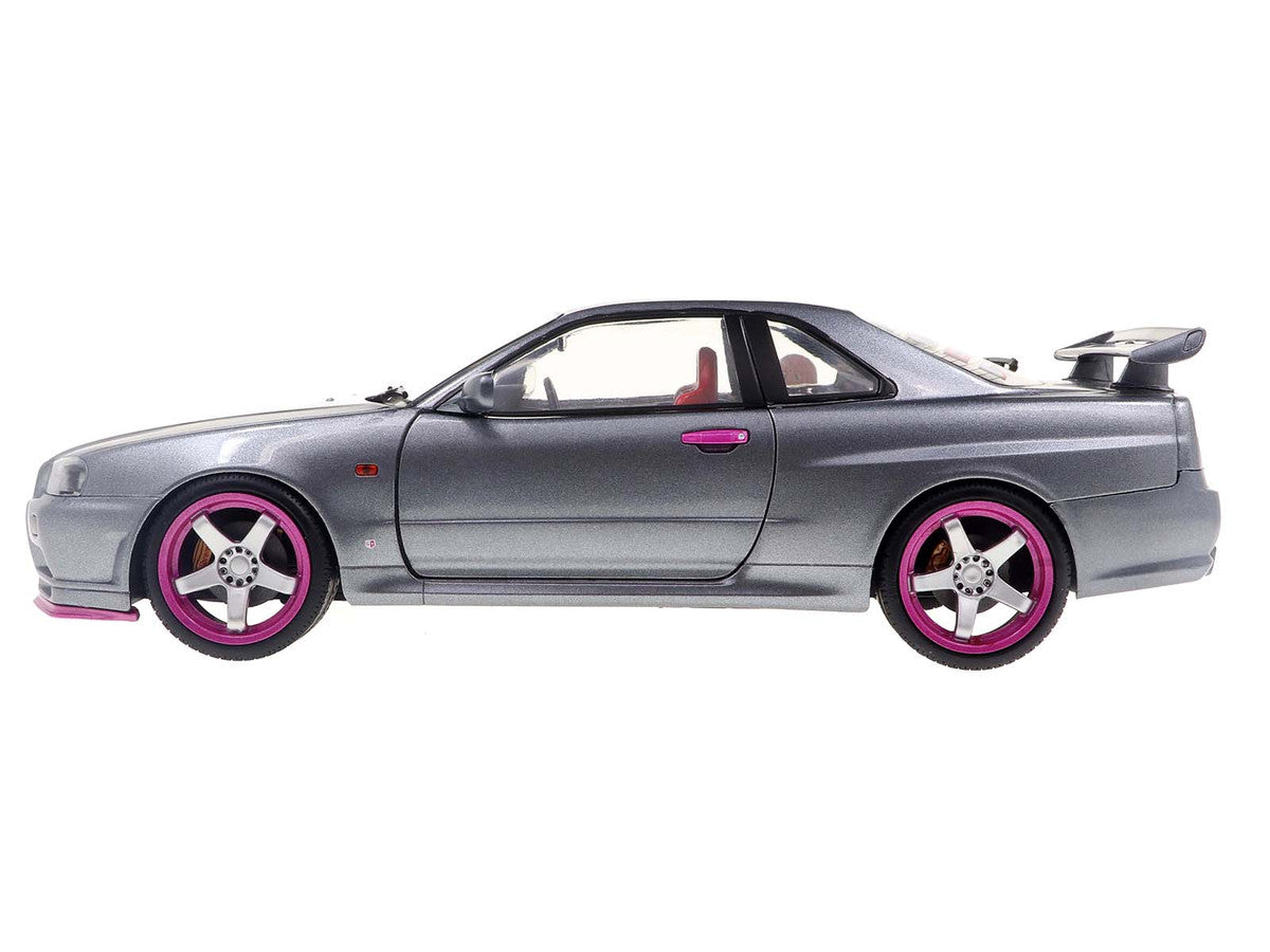1999 Nissan Skyline GT-R (R34) RHD (Right Hand Drive) Silver Metallic with Purple Wheels 1/18 Diecast Model Car by Solido Solido